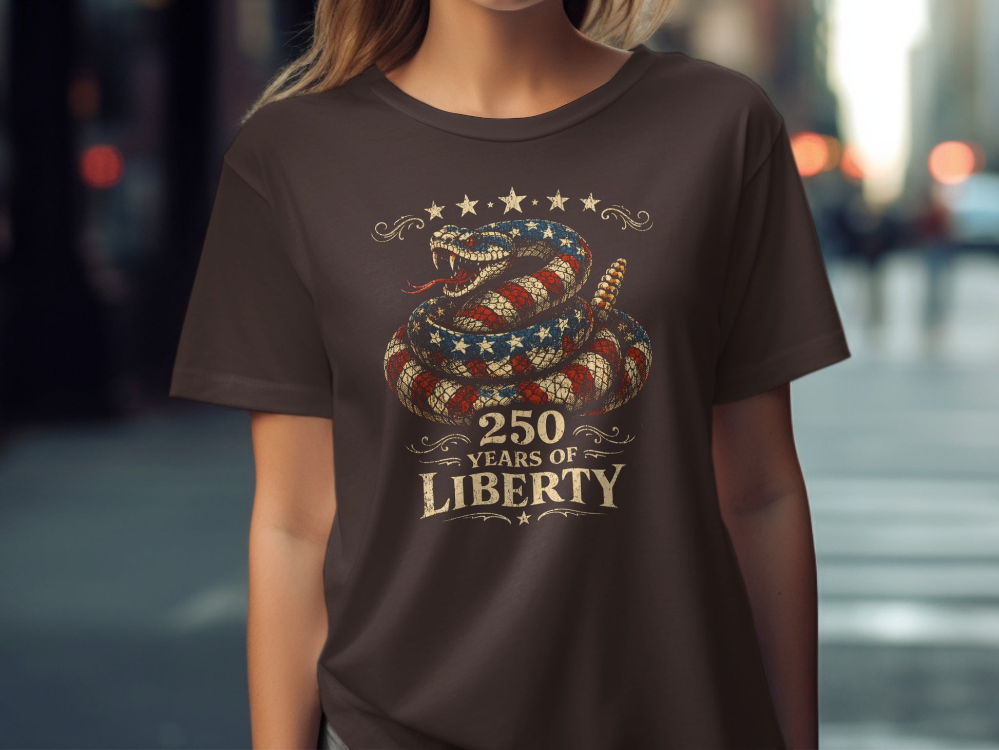 Brown t-shirt with coiled snake design and text "250 Years of Liberty".