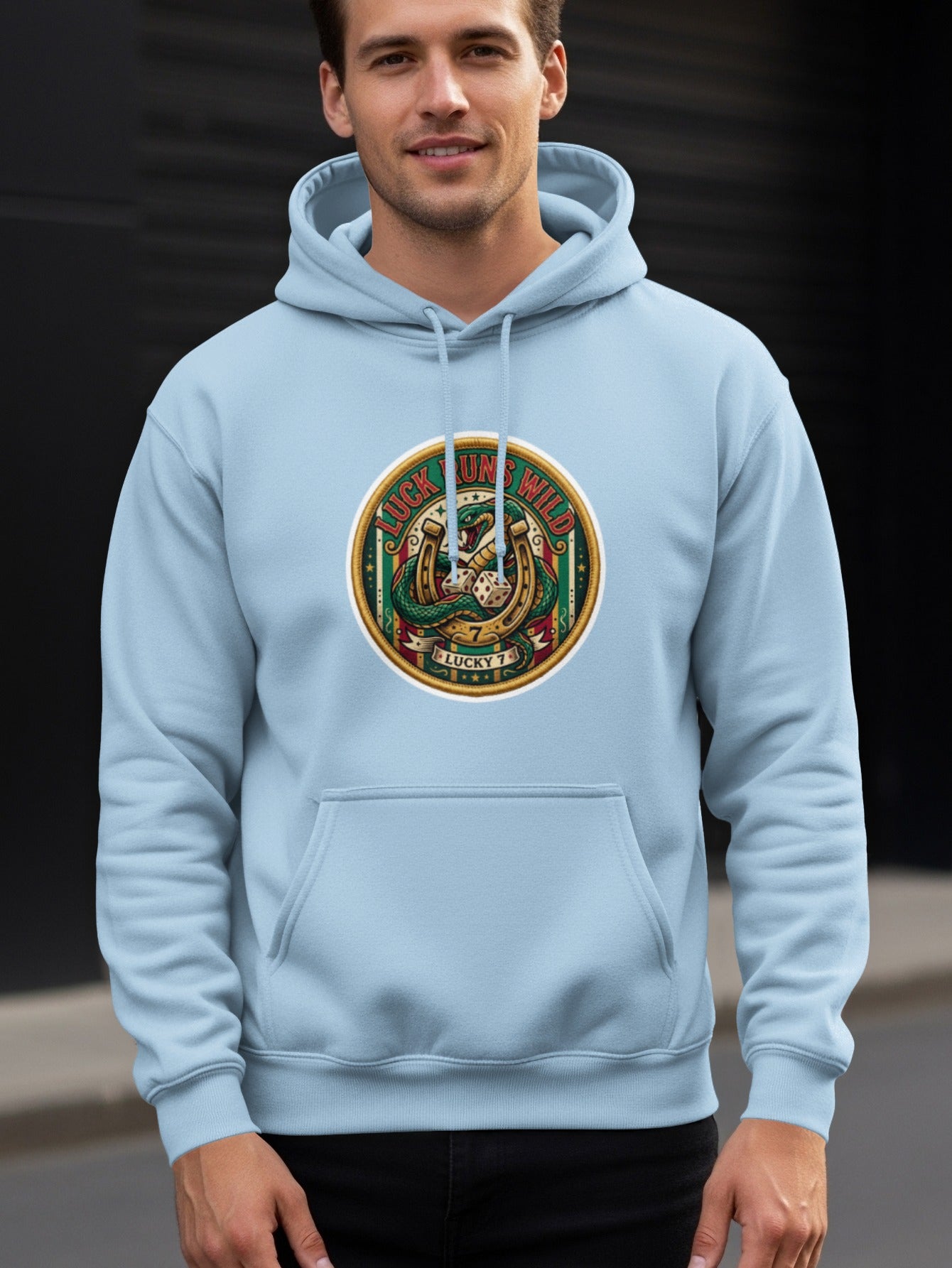 Light blue hoodie with a circular emblem featuring a snake and horseshoe.