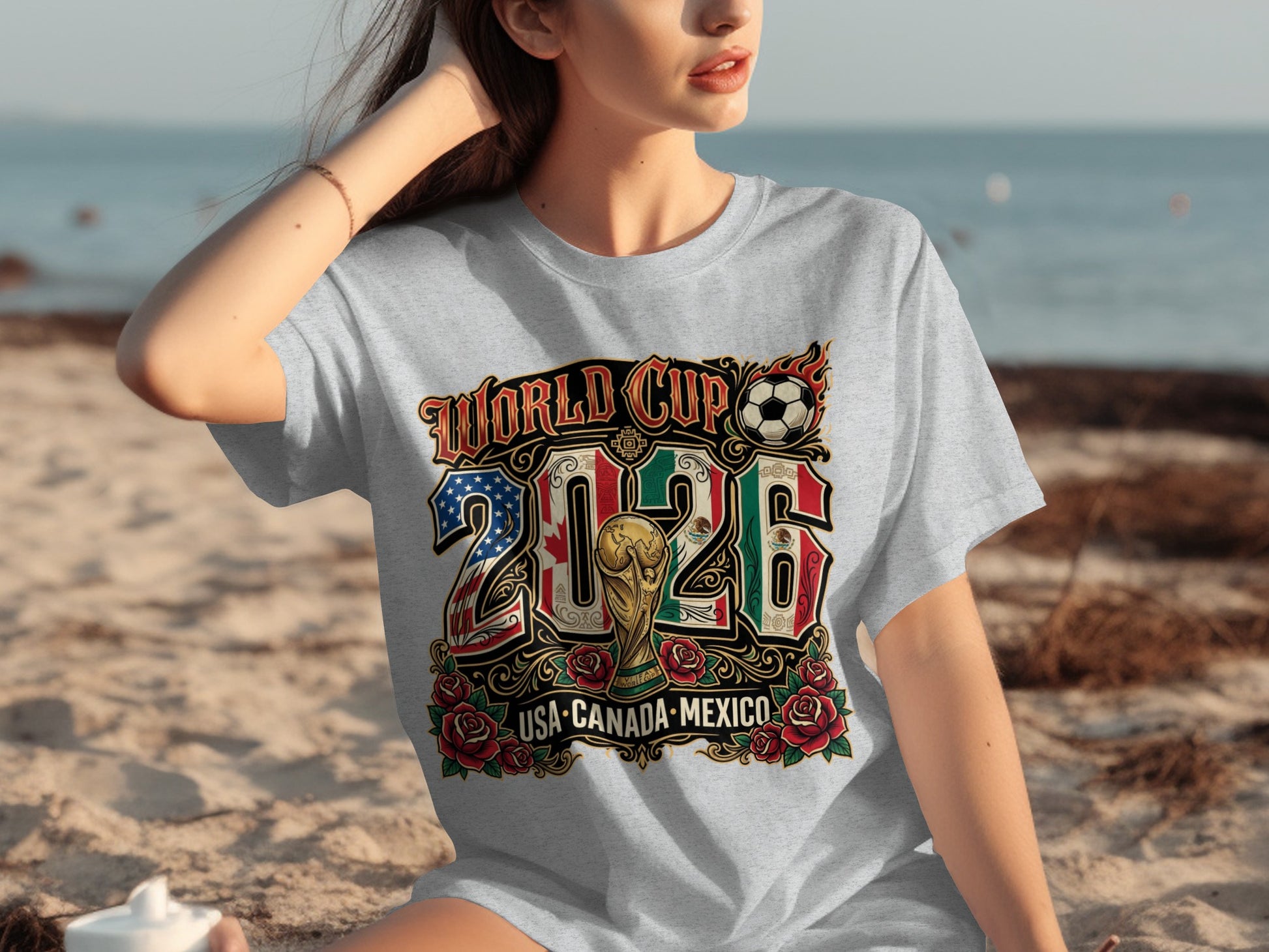 Grey t-shirt featuring "World Cup 2026 USA Canada Mexico" with soccer ball and trophy.