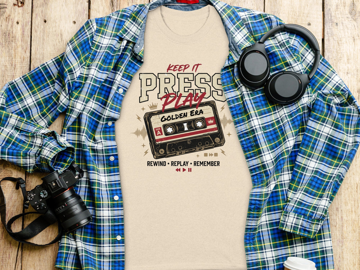 T-shirt with "Keep it Press Play Golden Era" cassette tape graphic.