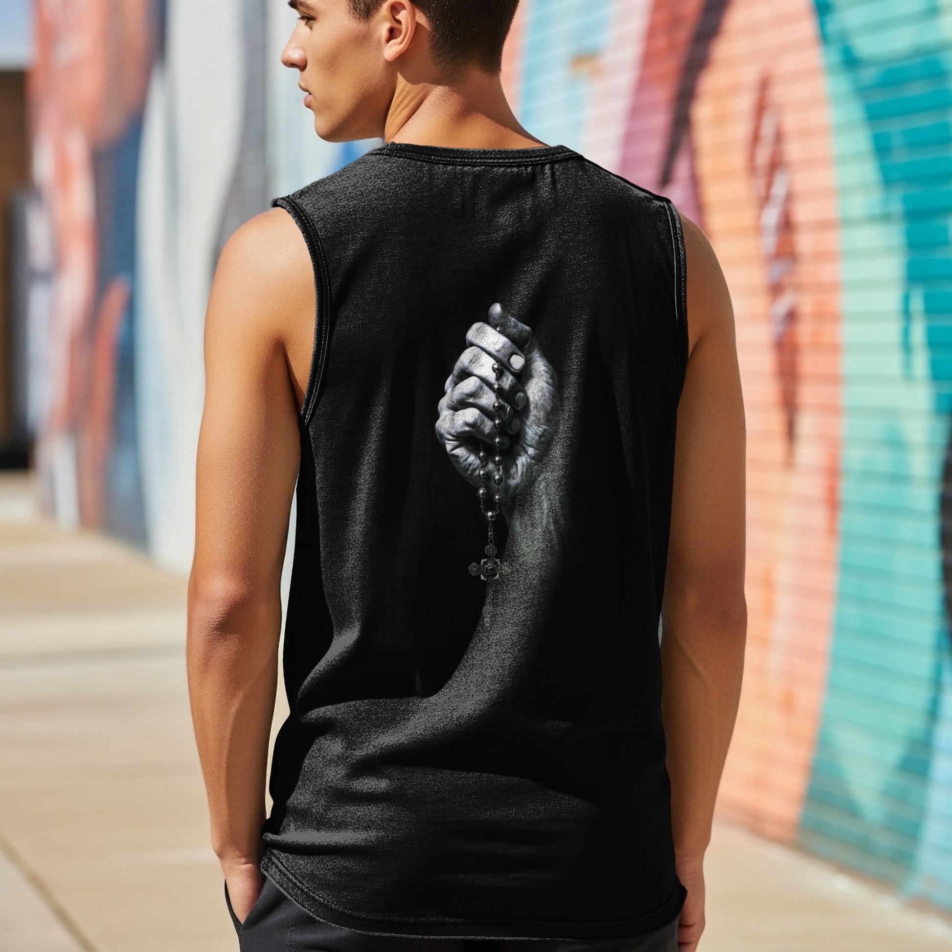 Black tank top with a grayscale image of a hand holding a rosary on the back.