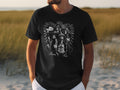 Black t-shirt featuring a vintage-style graphic of women with text.