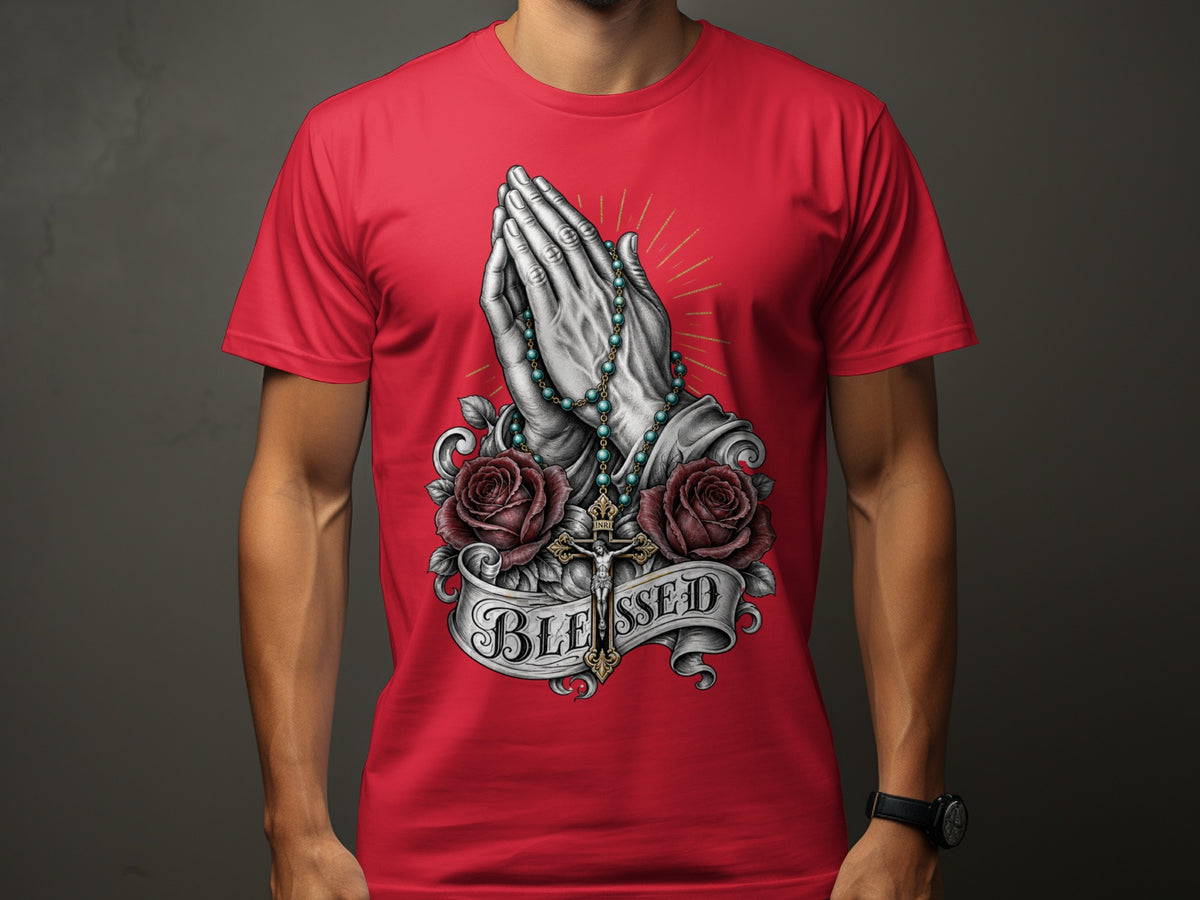 Red t-shirt with praying hands, rosary, roses, cross, and "BLESSED" banner.