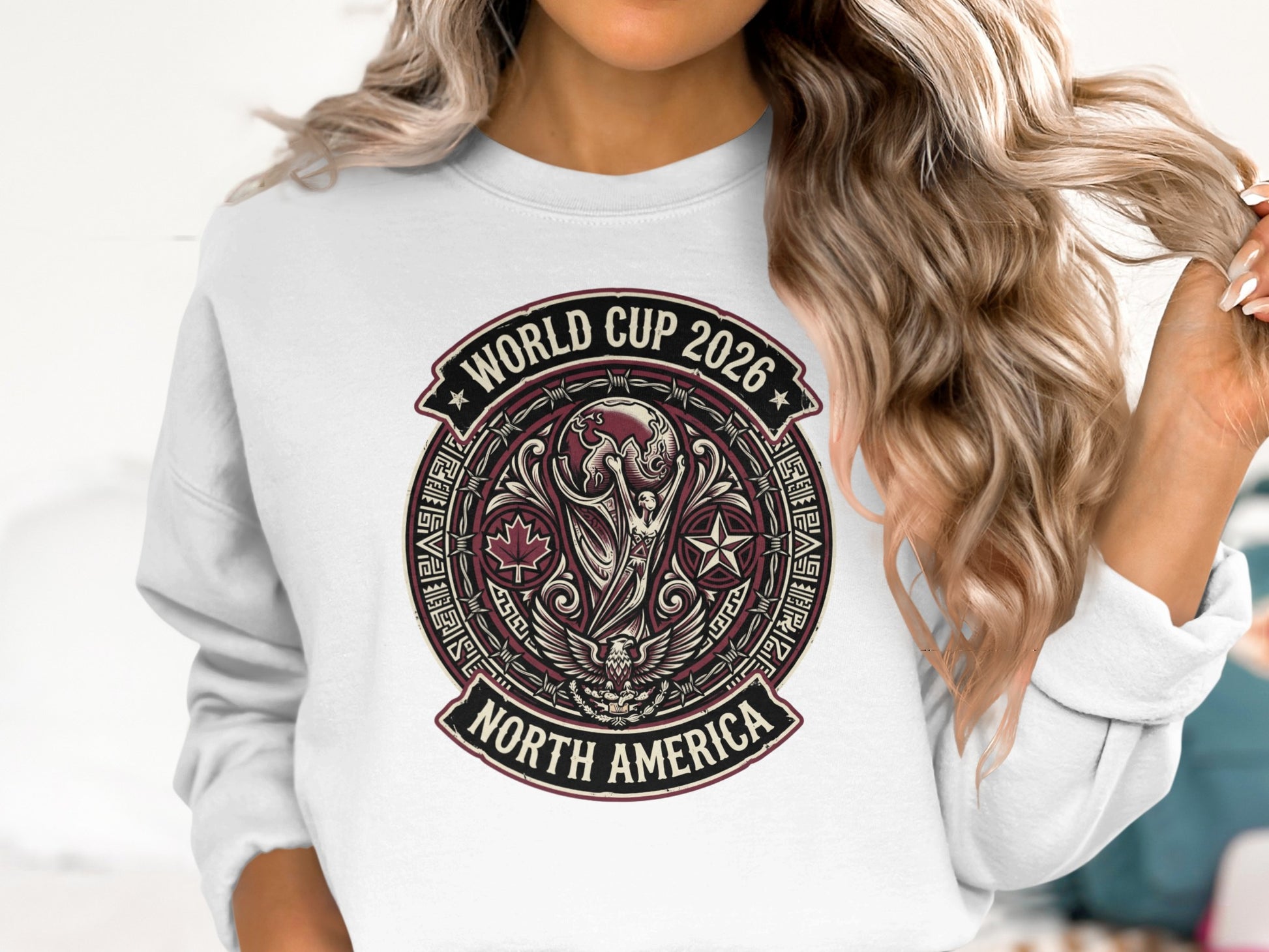 World Cup 2026 North America logo on a white sweatshirt.
