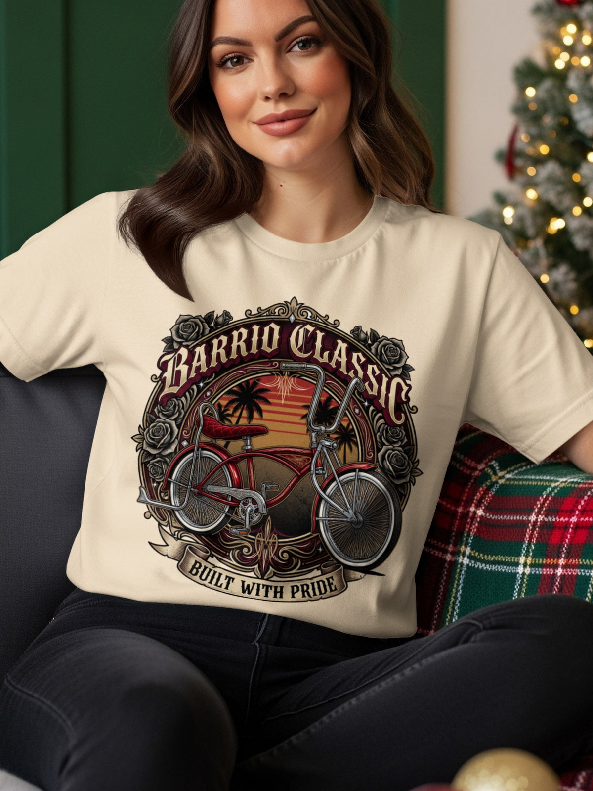 Cream t-shirt with "Barrio Classic Built With Pride" text and lowrider bicycle graphic.