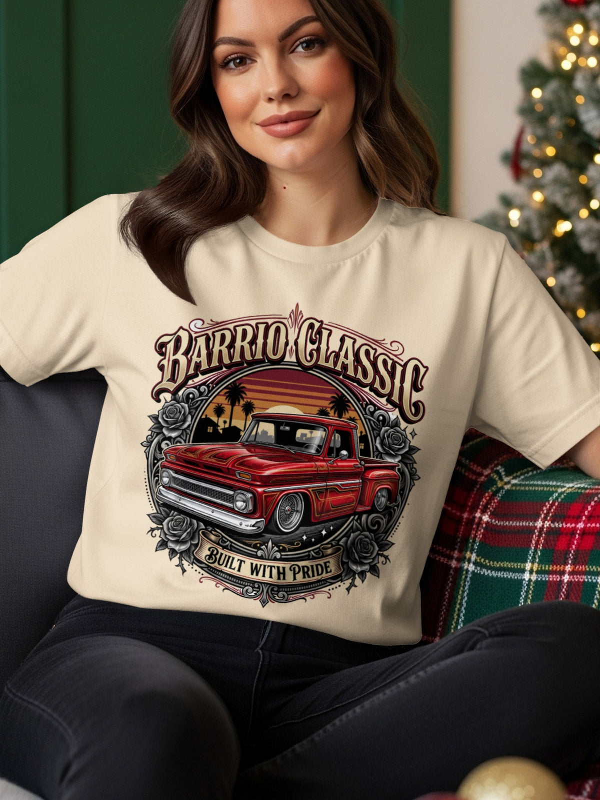 Cream t-shirt with red classic truck graphic, palm trees, and text "Barrio Classic Built With Pride".