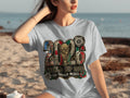 T-shirt with 2026 World Cup USA, Canada, Mexico logo featuring flags and soccer ball.