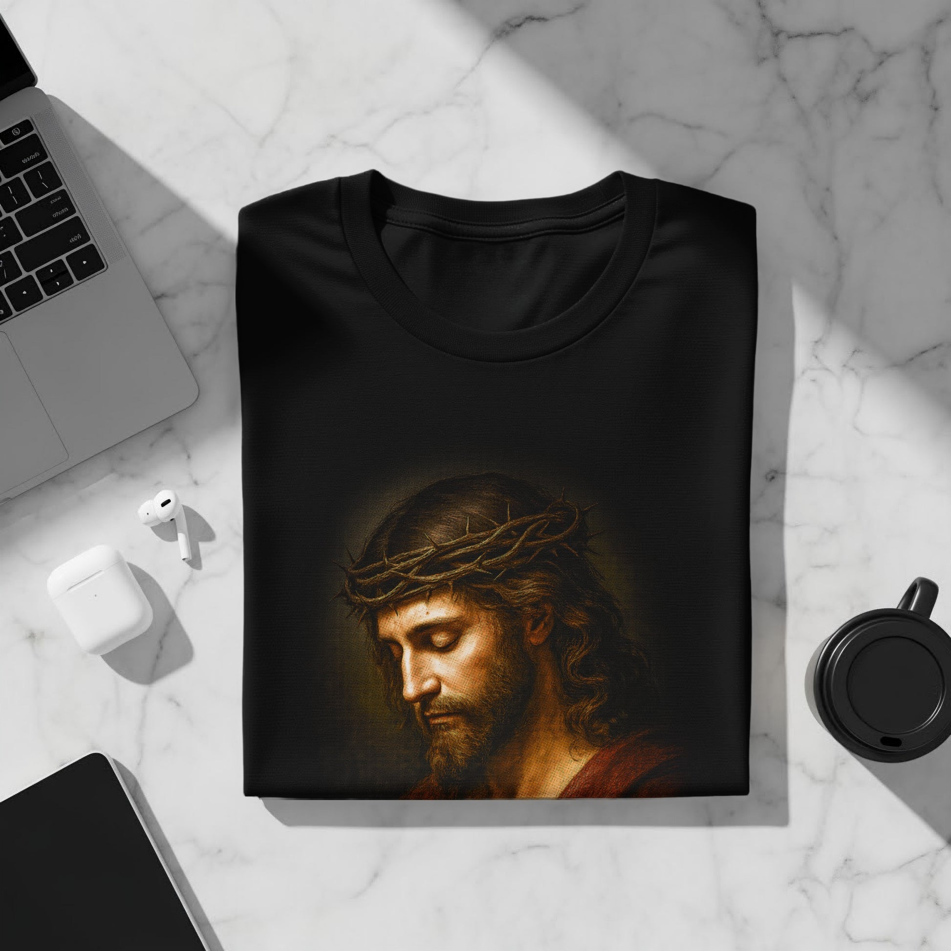 Black t-shirt with Jesus wearing a crown of thorns.