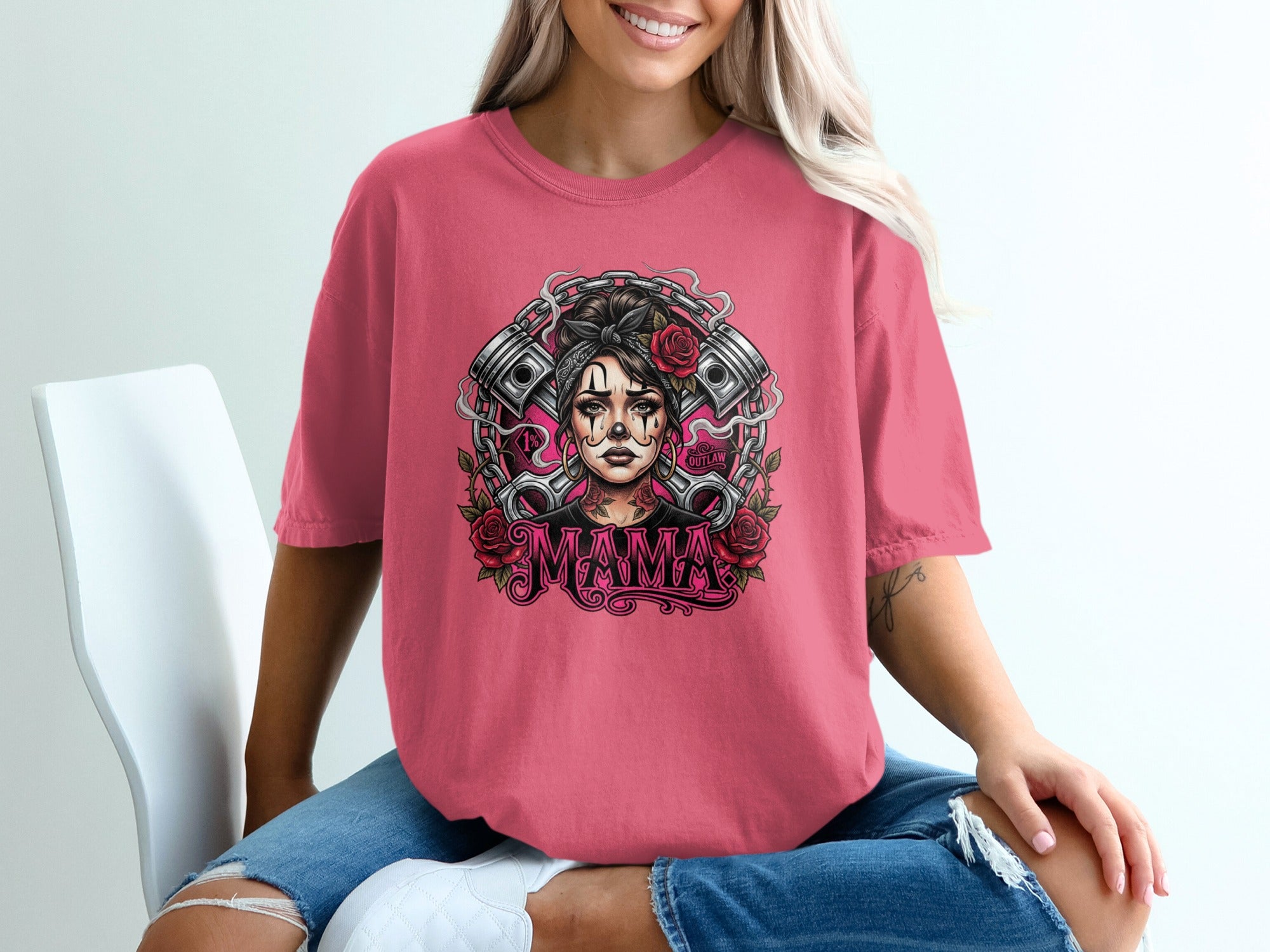 Pink t-shirt with a tattoo-style graphic of a woman with pistons and roses.