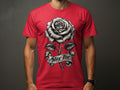 Red t-shirt with a black and white rose, banner, and text 