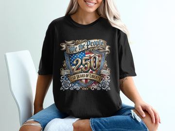 Black t-shirt with "We the People 250 Years of Liberty" patriotic design.