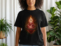 Black t-shirt featuring a bleeding heart with crown of thorns and cross.