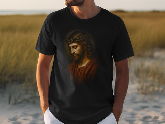 Black t-shirt with graphic of Jesus wearing a crown of thorns.