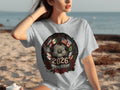 Grey t-shirt with World Cup 2026 crest featuring flags, soccer ball, and roses.