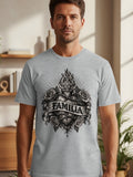 Grey t-shirt with a black and white tattoo-style graphic of a heart, cross, roses, and the word 