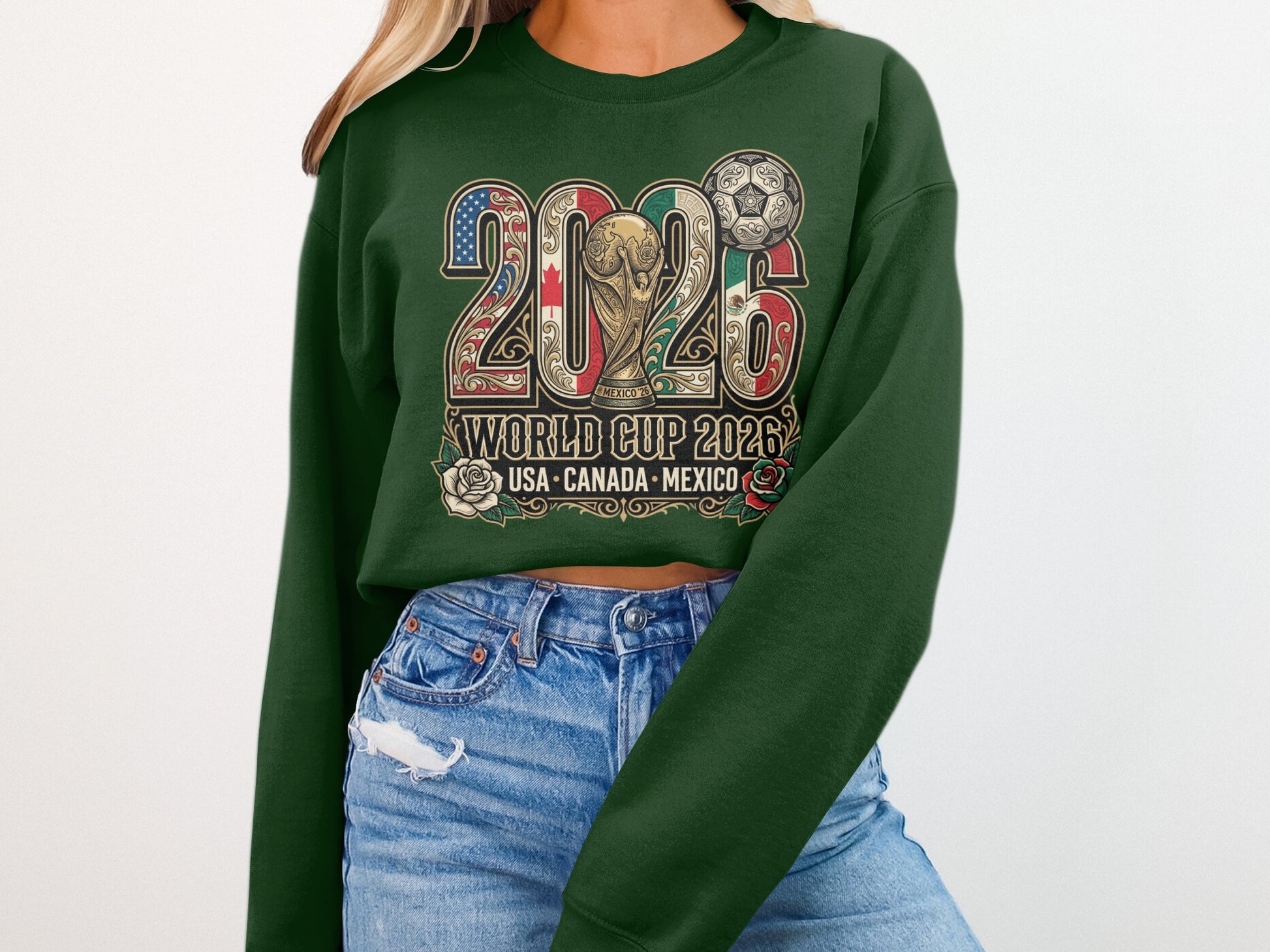 Green sweatshirt with "2026 World Cup USA Canada Mexico" and soccer imagery.