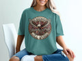 Circular graphic on t-shirt with eagle, wings spread, 