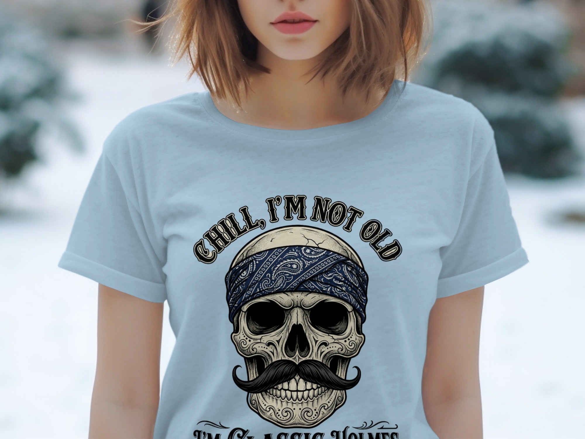 Light blue t-shirt with skull, bandana, mustache, and "CHILL, I'M NOT OLD" text.