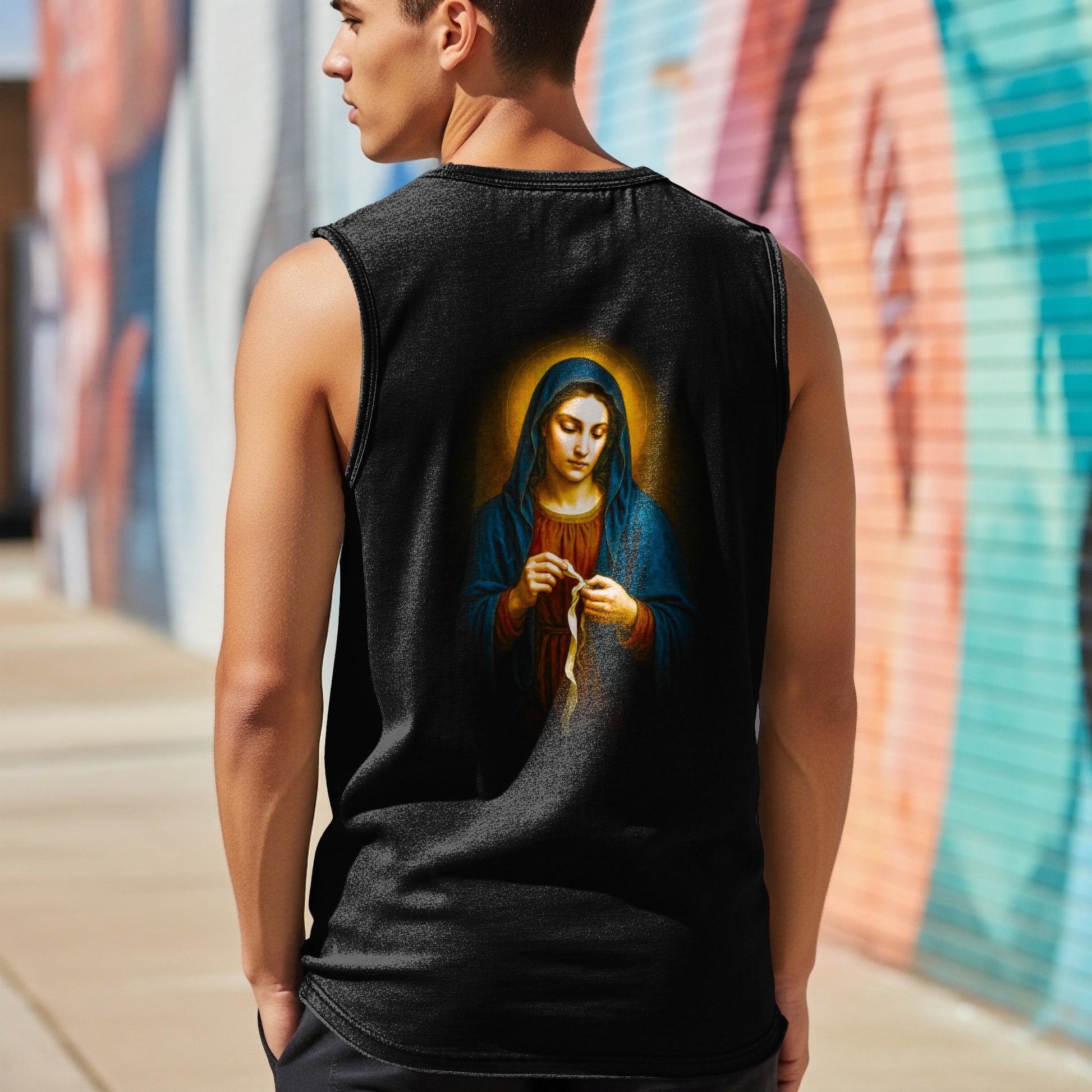Black tank top with religious depiction of Mary on the back.