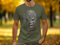 Green t-shirt with a metallic lucha libre mask design featuring a Mexican eagle.