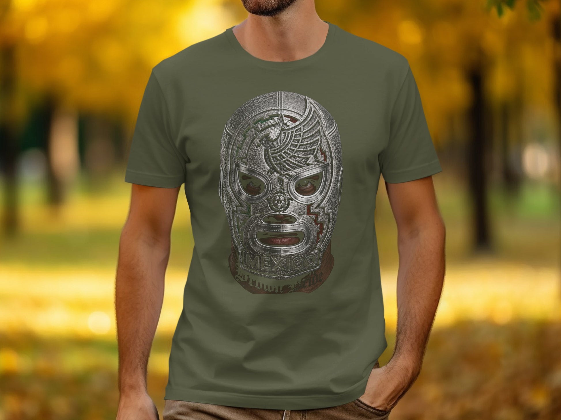 Green t-shirt with a metallic lucha libre mask design featuring a Mexican eagle.