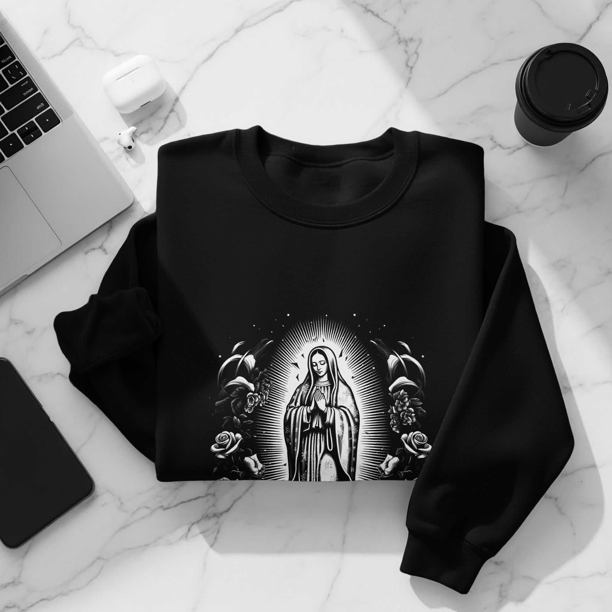 Black sweatshirt featuring Our Lady of Guadalupe artwork with roses.