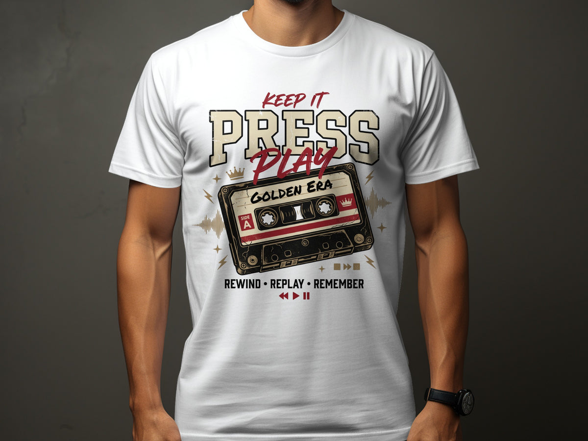 White t-shirt with "Keep It Press Play Golden Era" and cassette tape design.