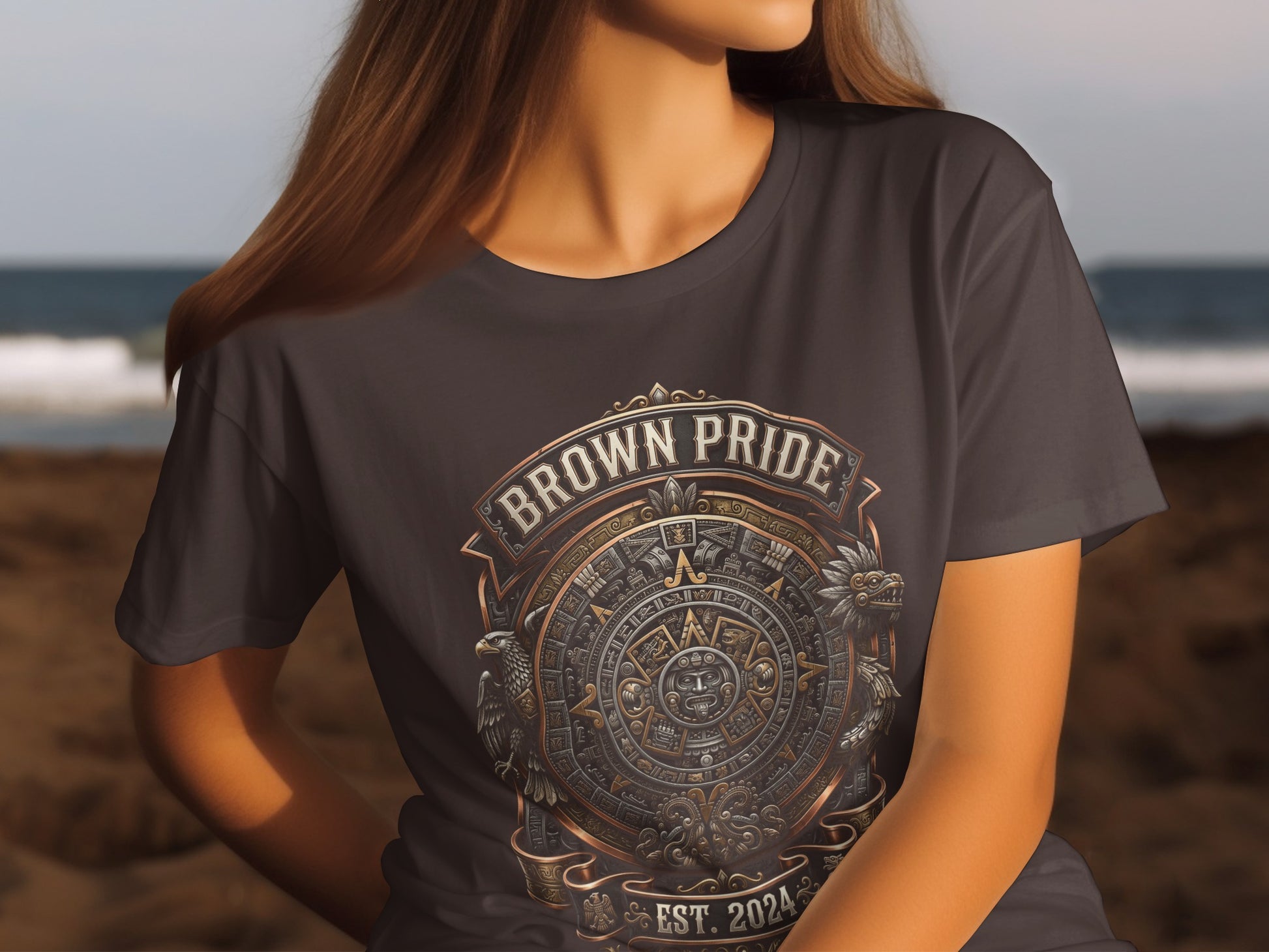 Brown t-shirt with Aztec calendar design and "Brown Pride Est. 2024" text.