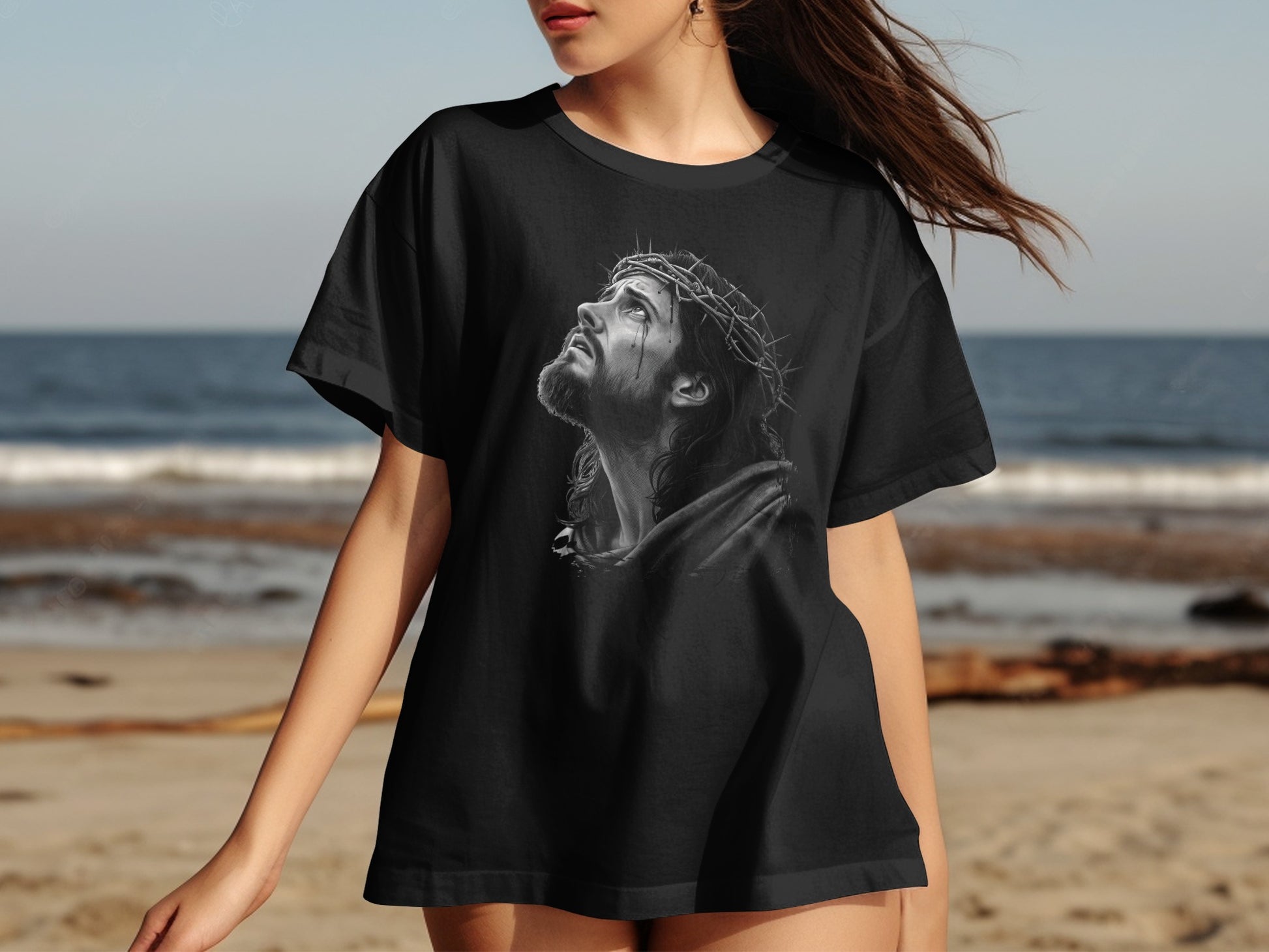 Black t-shirt with Jesus Christ wearing a crown of thorns.