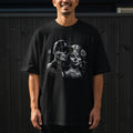 Black t-shirt featuring a Day of the Dead couple illustration with 