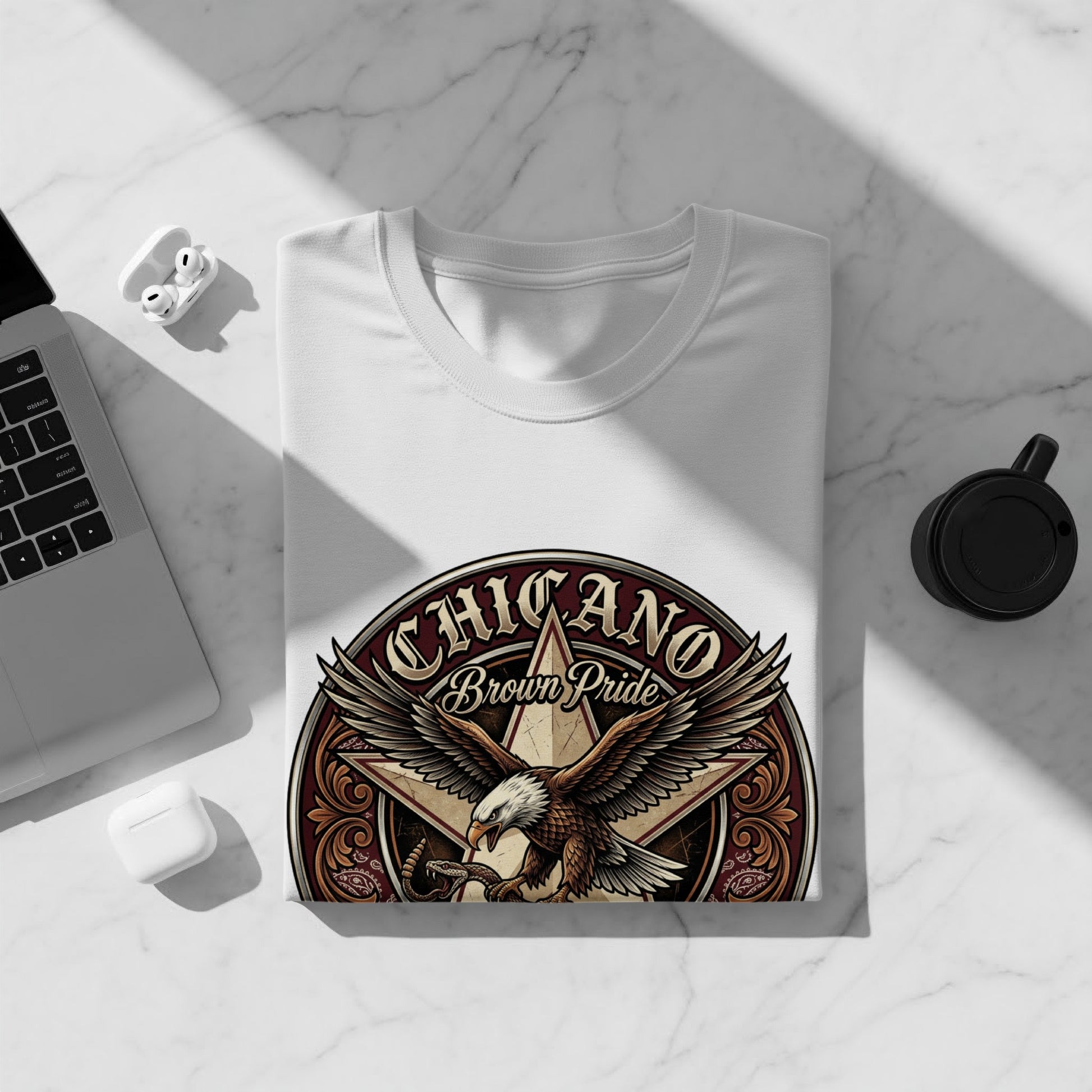 White t-shirt with Chicano Brown Pride eagle and snake design.