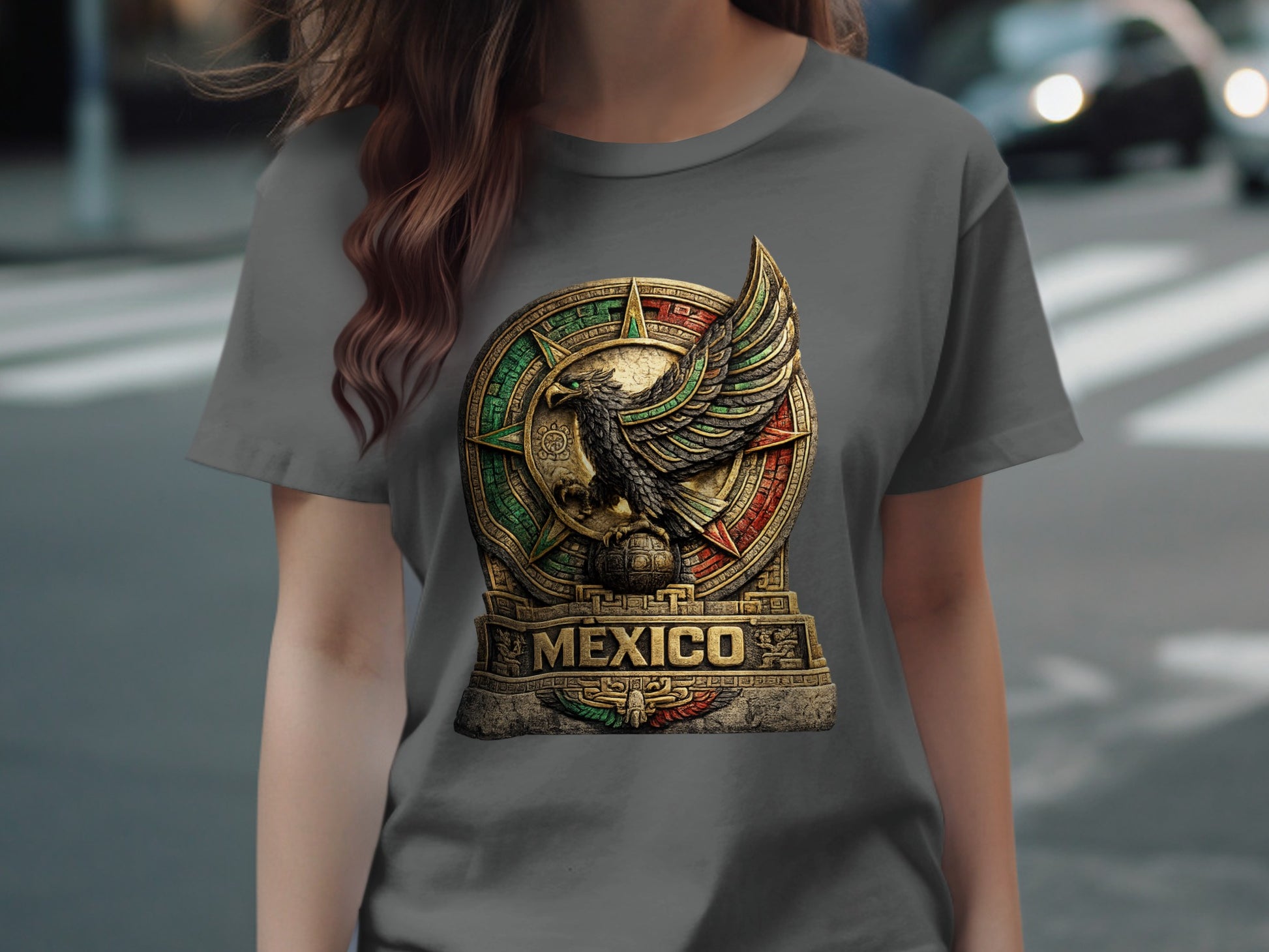 Dark grey t-shirt with circular Mexican eagle emblem featuring gold, green, and red.