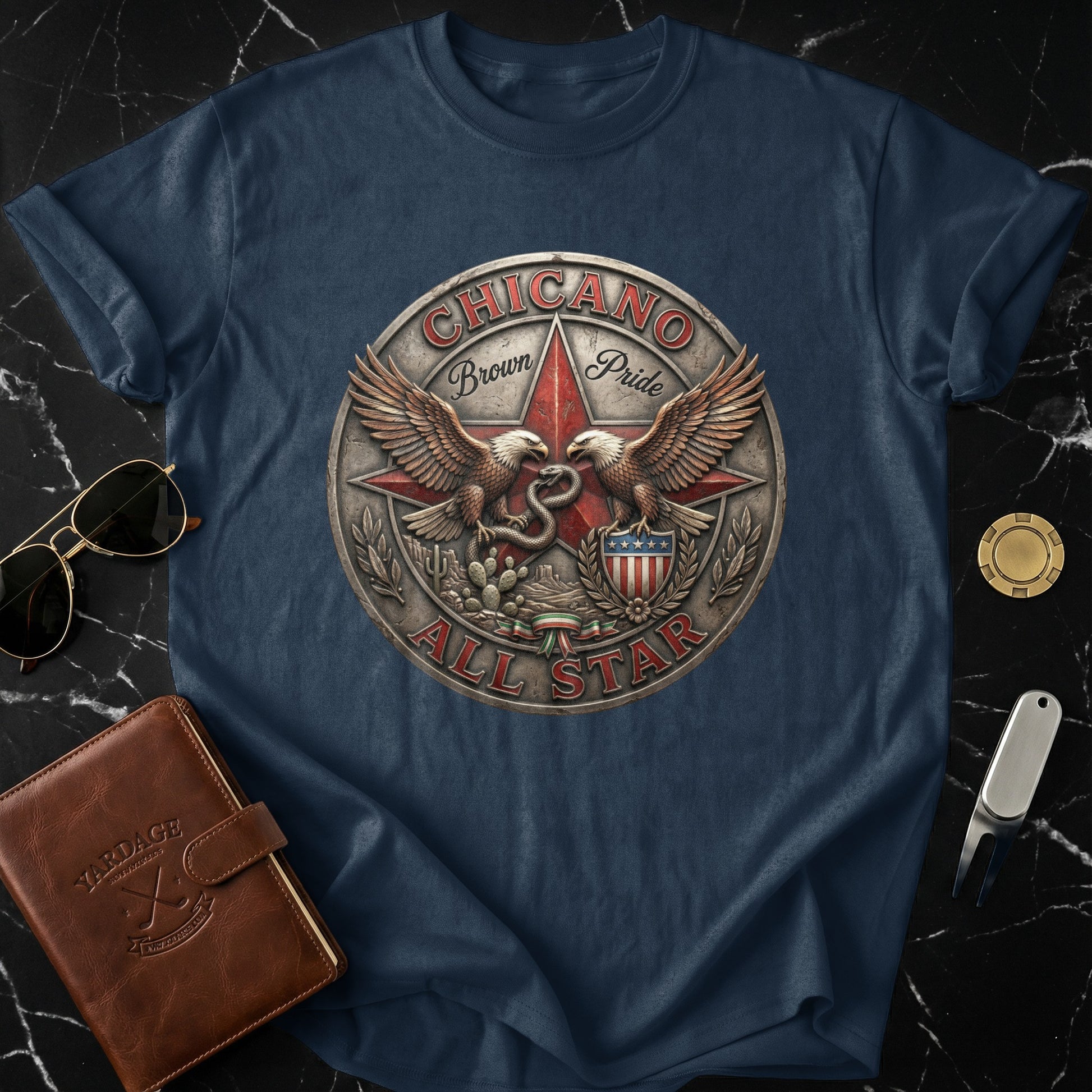 Navy t-shirt featuring a circular emblem with eagles and "Chicano Brown Pride All Star" text.