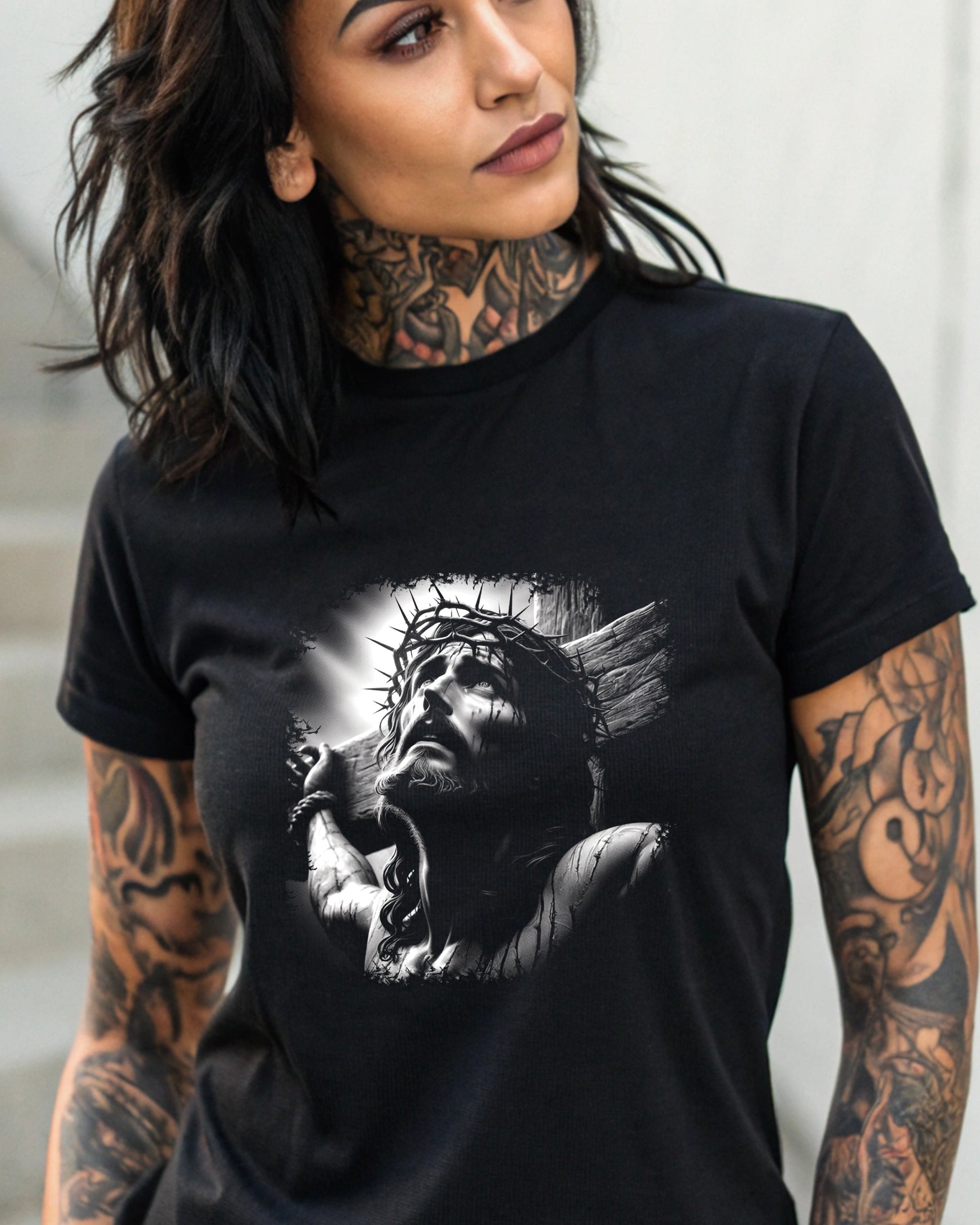 Jesus wearing a crown of thorns on a black t-shirt.
