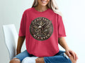 Crimson t-shirt with circular Chicano Brown Pride All Star eagle graphic.