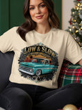 T-shirt graphic with turquoise lowrider truck, roses, and text 