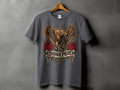 Dark grey t-shirt with a graphic of an eagle fighting a snake, surrounded by roses and text.