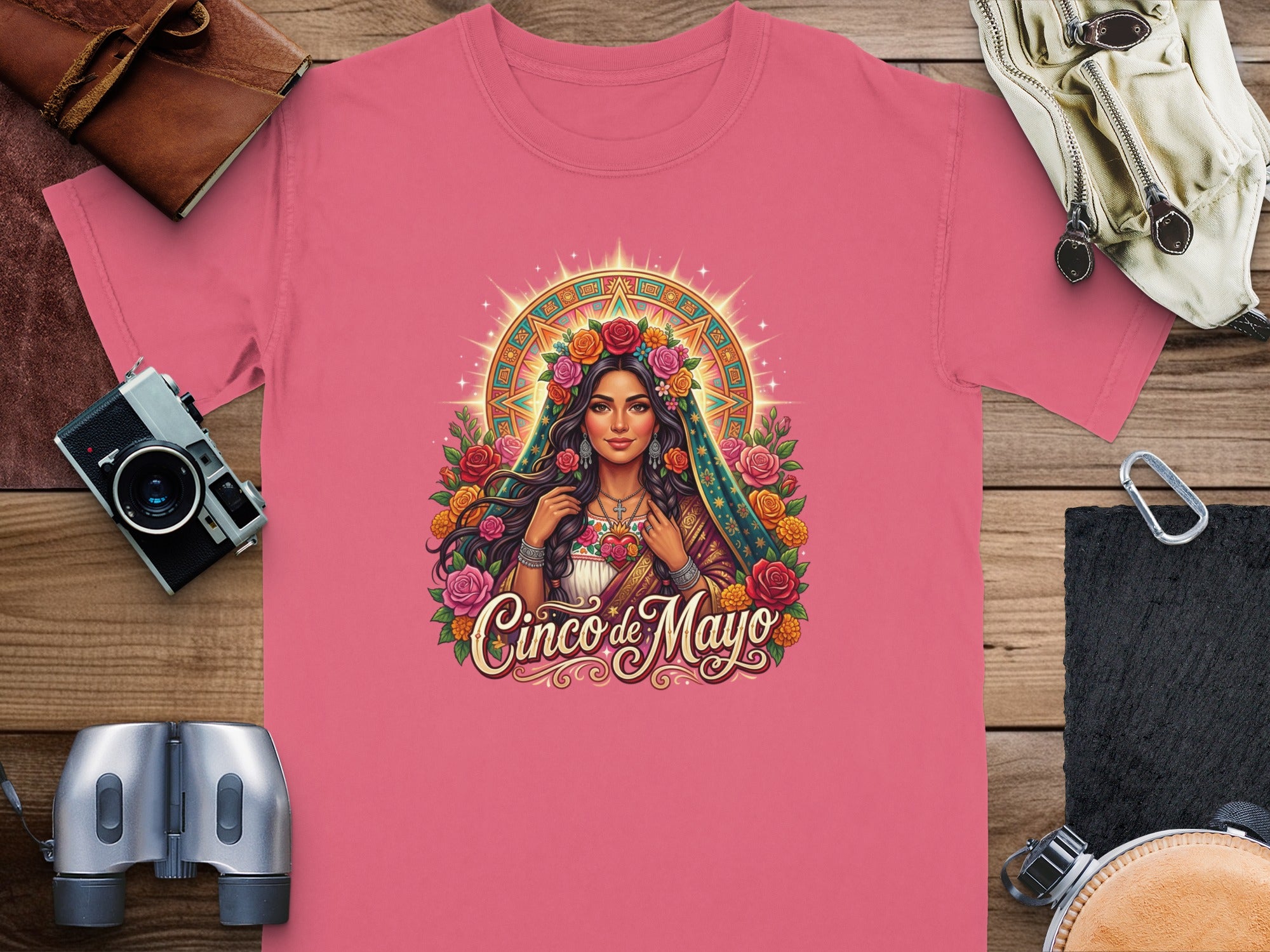 Woman in floral crown and jewelry with "Cinco de Mayo" text.