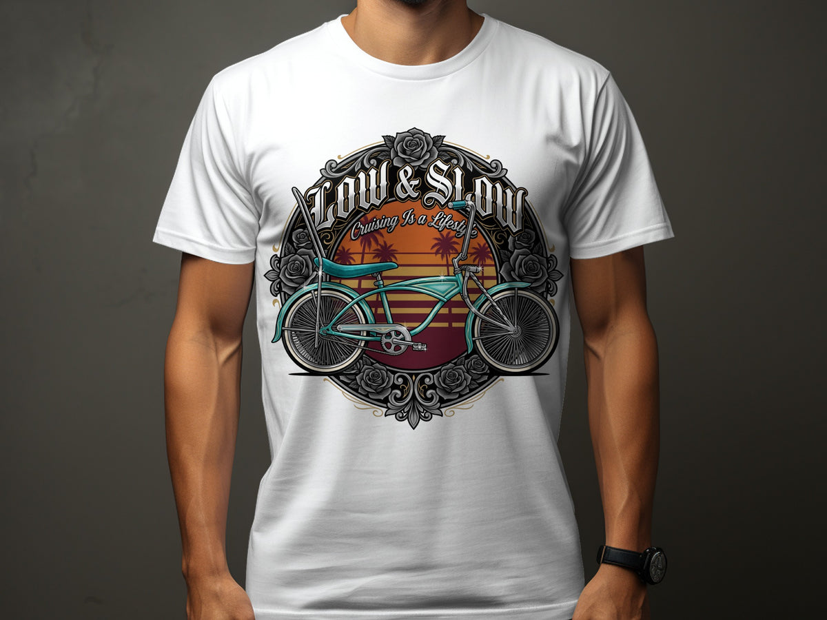 White t-shirt with a circular graphic featuring a lowrider bicycle, roses, and text "Low & Slow Cruising Is A Lifestyle".