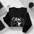 Black sweatshirt with a half skull, half woman graphic and floral accents.
