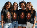 Four young women wearing t-shirts with a Sacred Heart design.