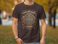 Dark brown t-shirt with Aztec calendar design and text 