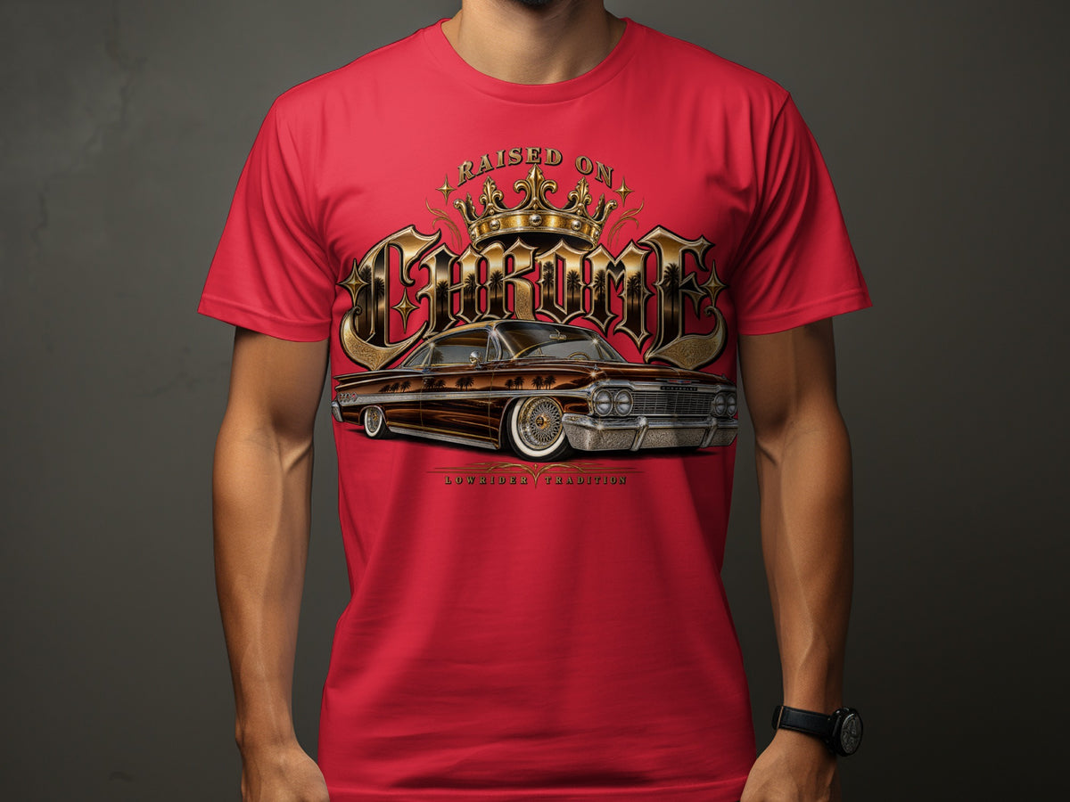 Red t-shirt with gold lettering "Raised On Chrome" and a classic lowrider car.