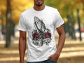 White t-shirt with praying hands, rosary, roses, cross, and 