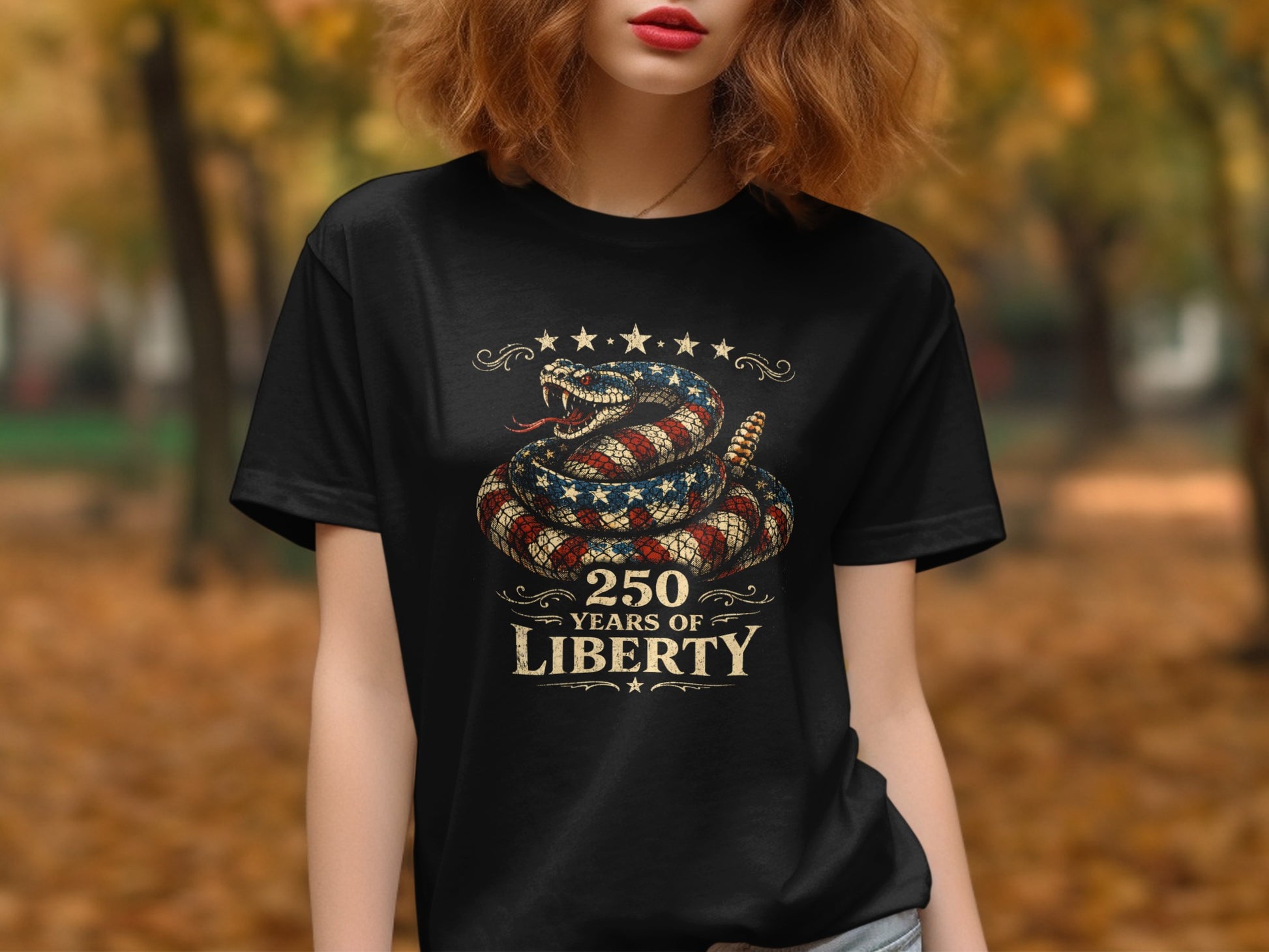 Black t-shirt with coiled snake on US flag background, "250 Years of Liberty".