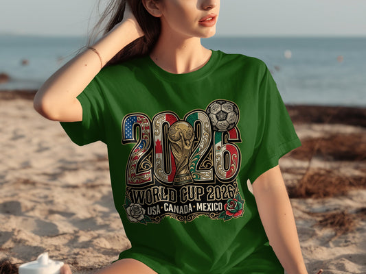 Green t-shirt with "2026 World Cup USA Canada Mexico" graphic featuring flags and a soccer ball.
