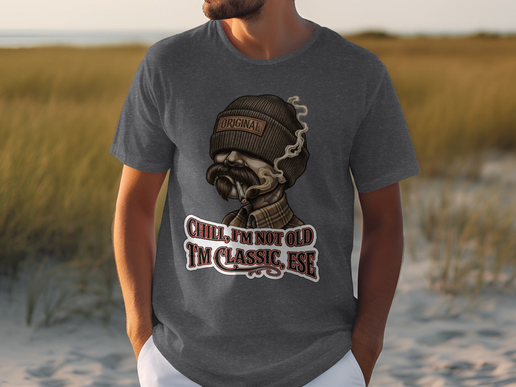 Grey t-shirt with a cartoon man wearing a beanie and plaid shirt, smoking.