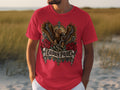 Red t-shirt with eagle, snake, roses, and 