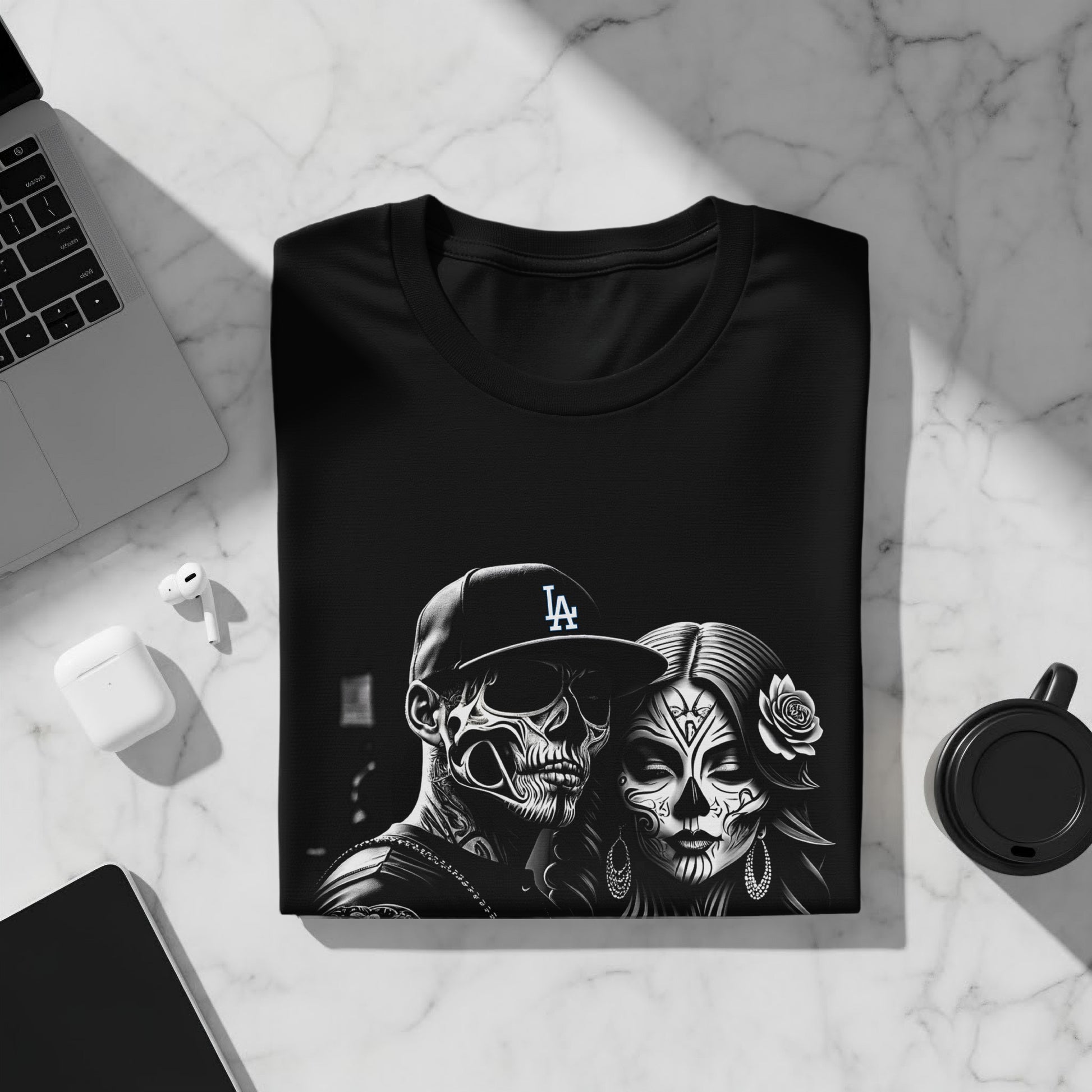 Black t-shirt with skull couple graphic, LA Dodgers logo.