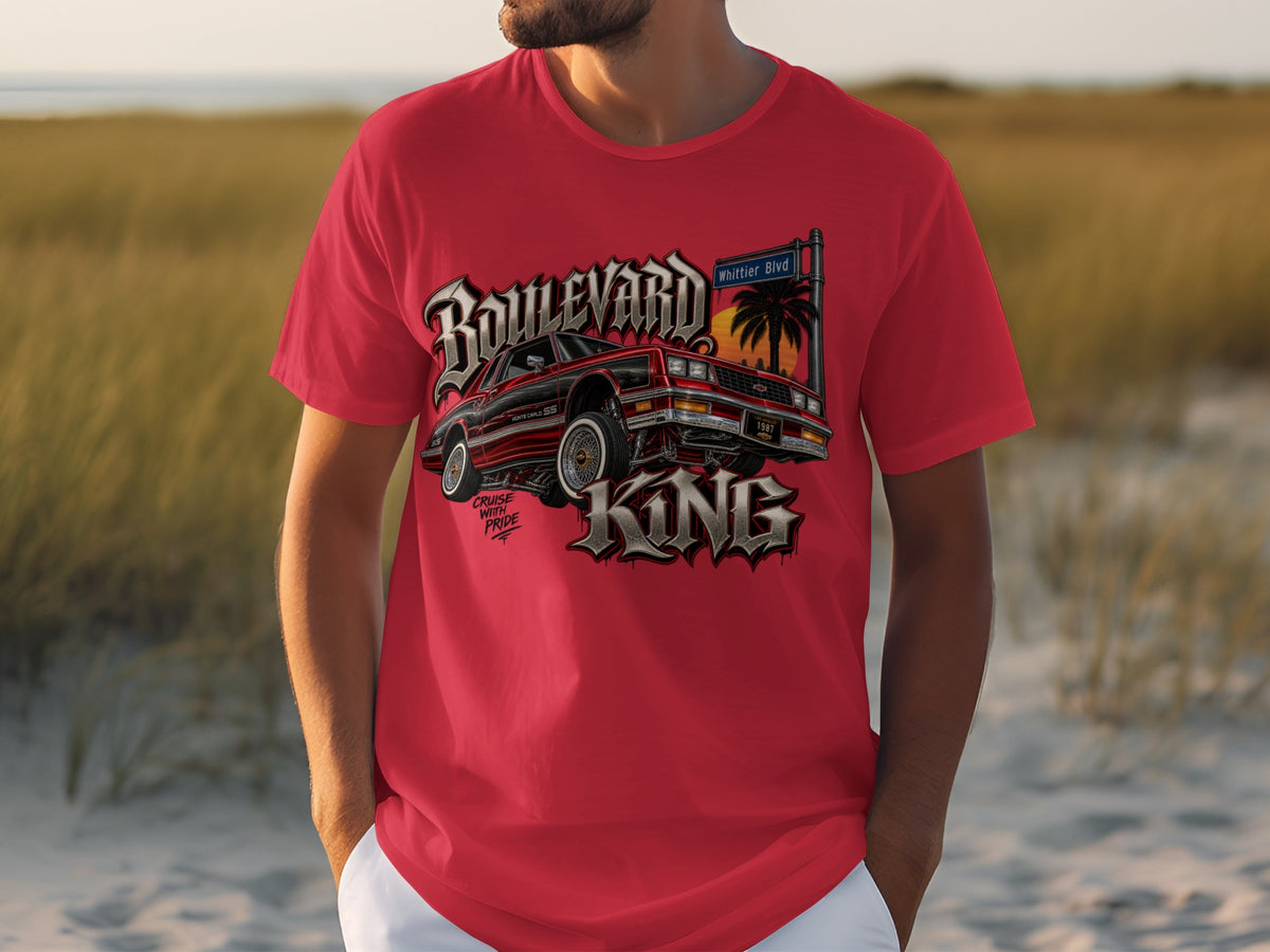 Red t-shirt with "Boulevard King" graphic of a red Monte Carlo SS and palm trees.